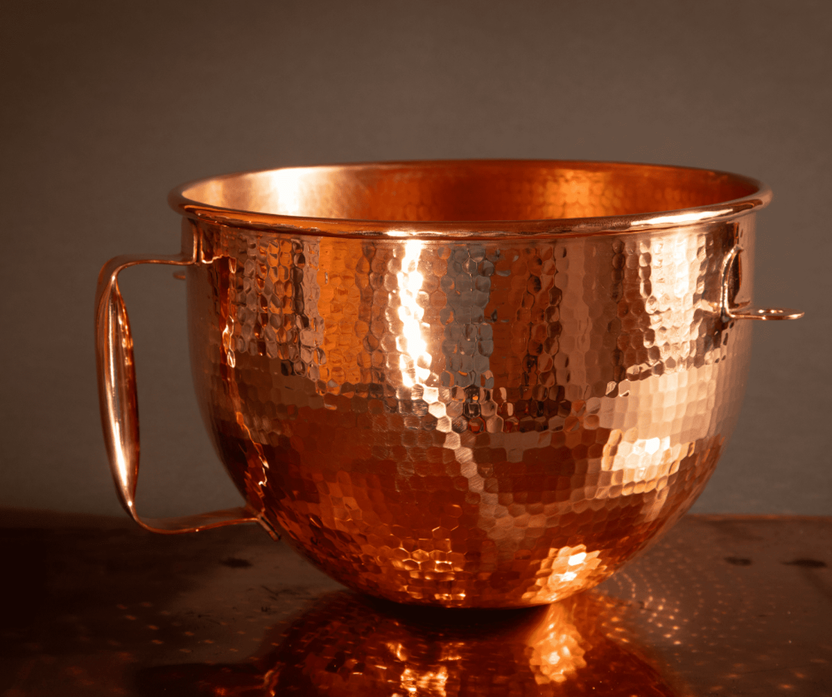 Hand-hammered solid copper mixing bowl for KitchenAid lift stand mixers, featuring a polished finish and sturdy side handle.