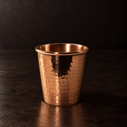 Handcrafted Apa copper water cup featuring a durable, polished hammered finish for a timeless, elegant aesthetic.