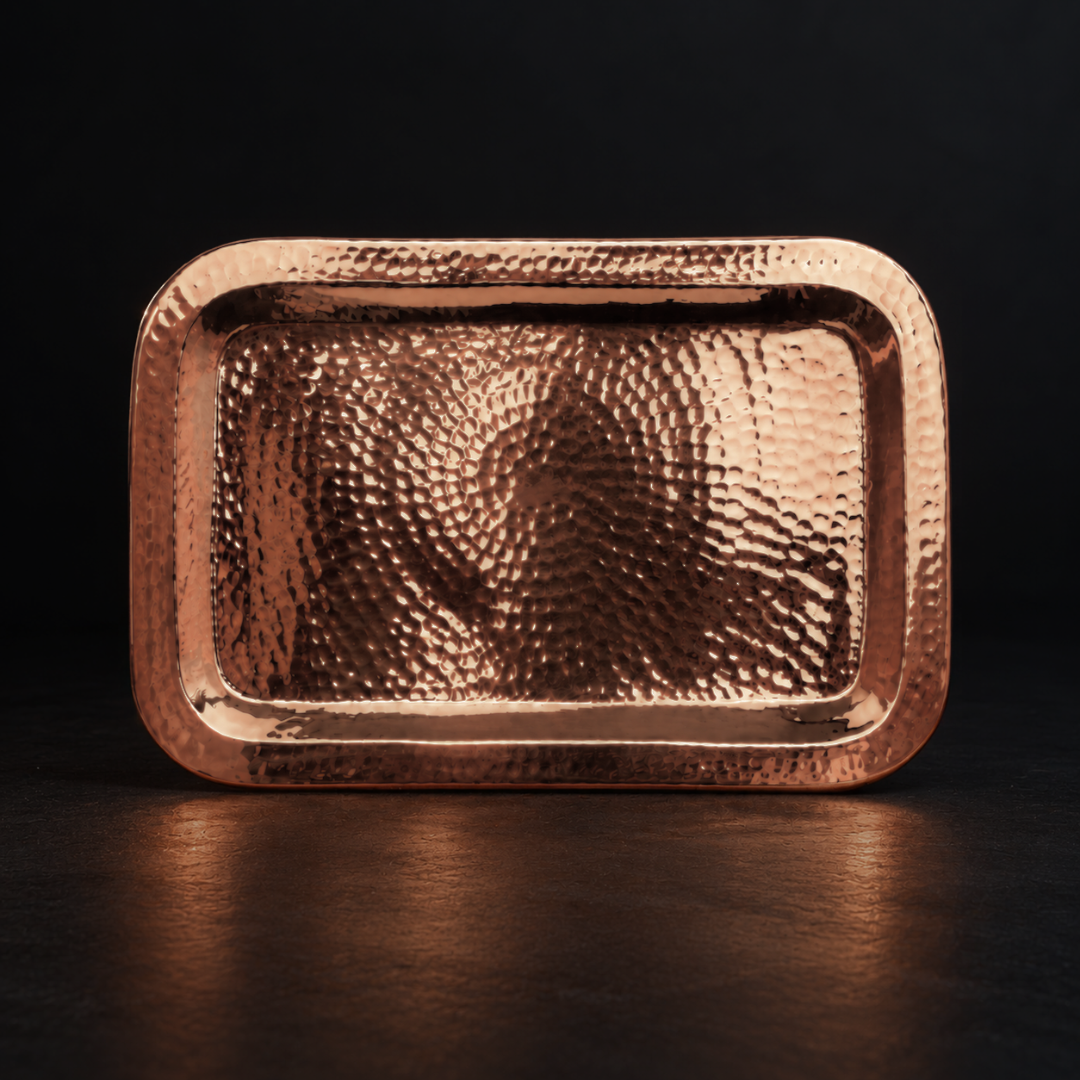 Hand-hammered 12x7 inch rectangular copper tray with a polished finish, perfect for bar service or home decor.