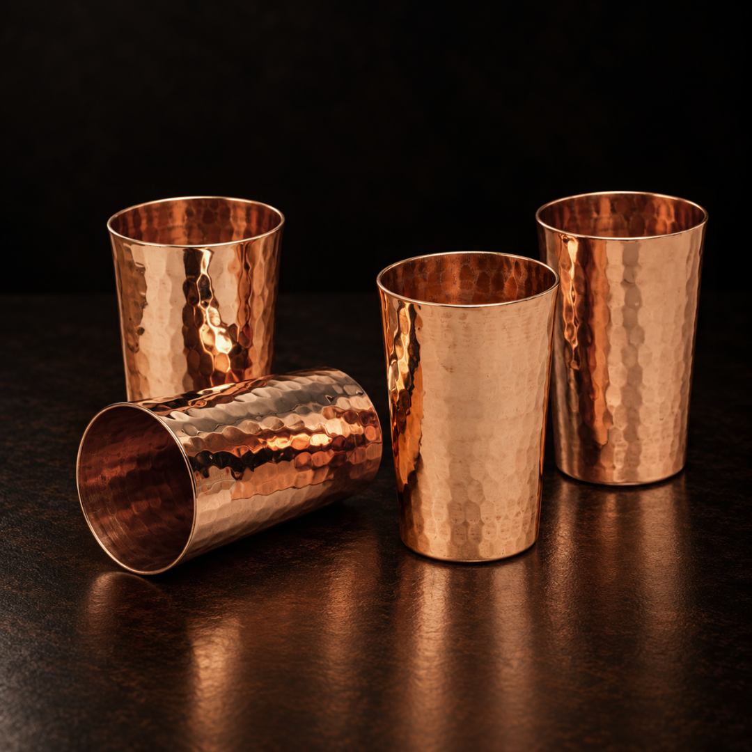 Three tall, hammered copper Tequilero shot cups with a 1.69-ounce capacity, perfect for chilled tequila service.