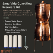 Hammered copper Sana Vida GuardFlow water filtration system with site tube spigot, stainless base, and four ceramic filters.