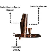 Hammered copper barman's set with shaker, jigger, bar spoon, tray, and butler bell.