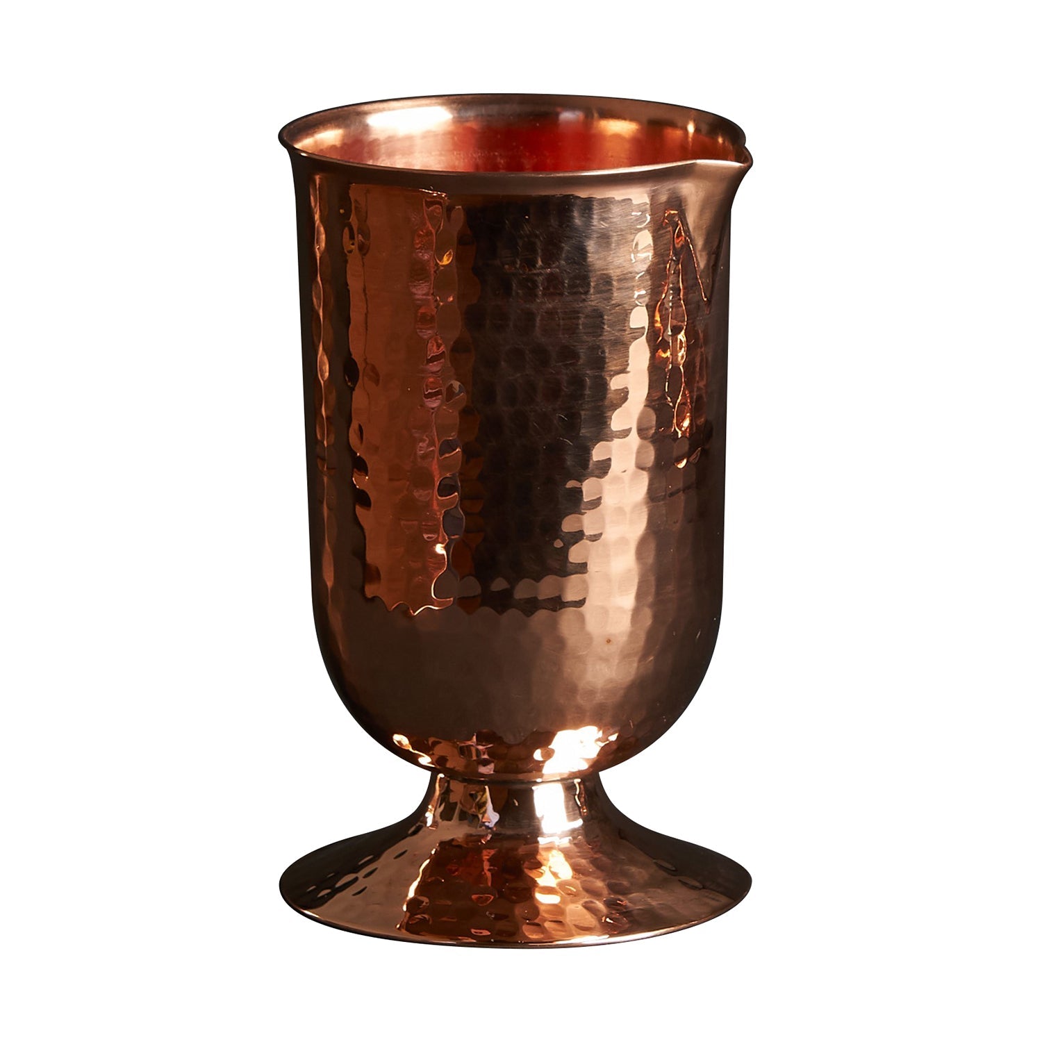 Hammered copper cocktail glass with a rounded pedestal base, 20-ounce capacity.