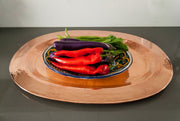 Thessaly Oval Copper Platter - in use