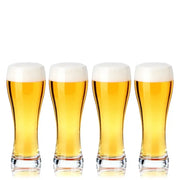 Set of 4 clear 23 oz pilsner beer glasses, each filled with golden beer and white foam.
