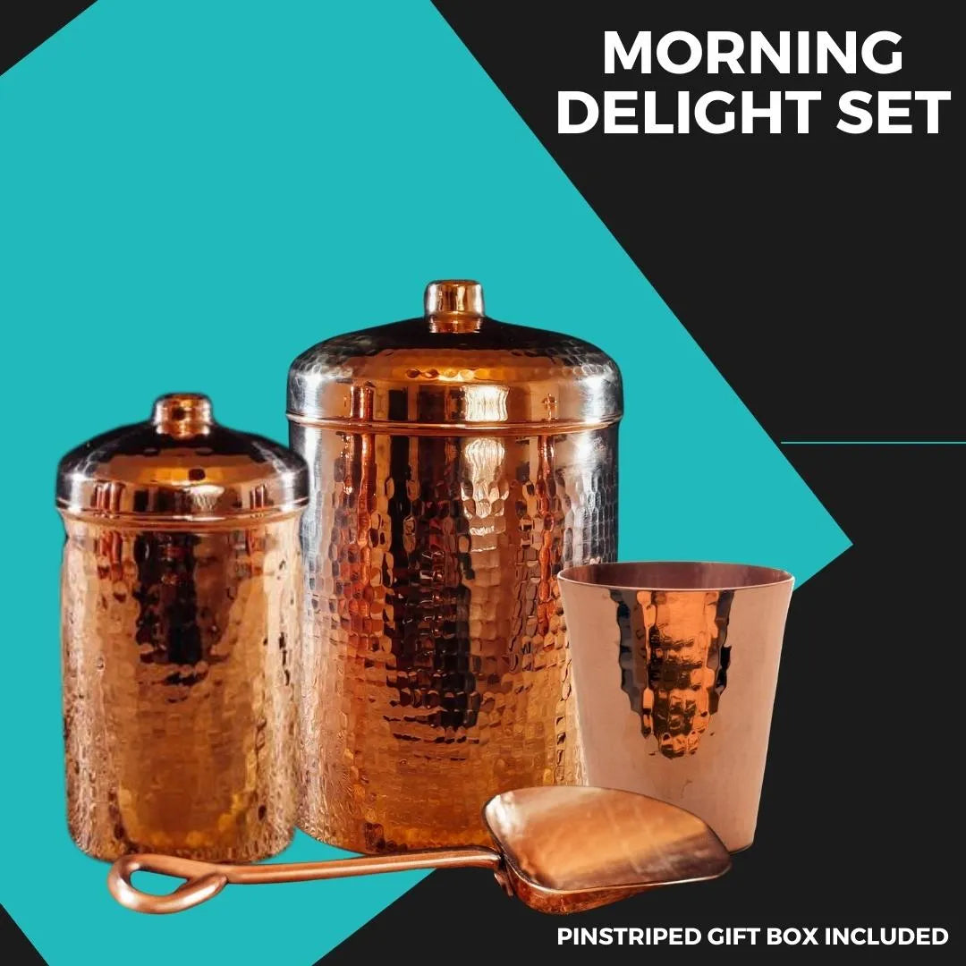 Hammered copper canister set with coffee, sugar canisters, creamer copita, and scoop.