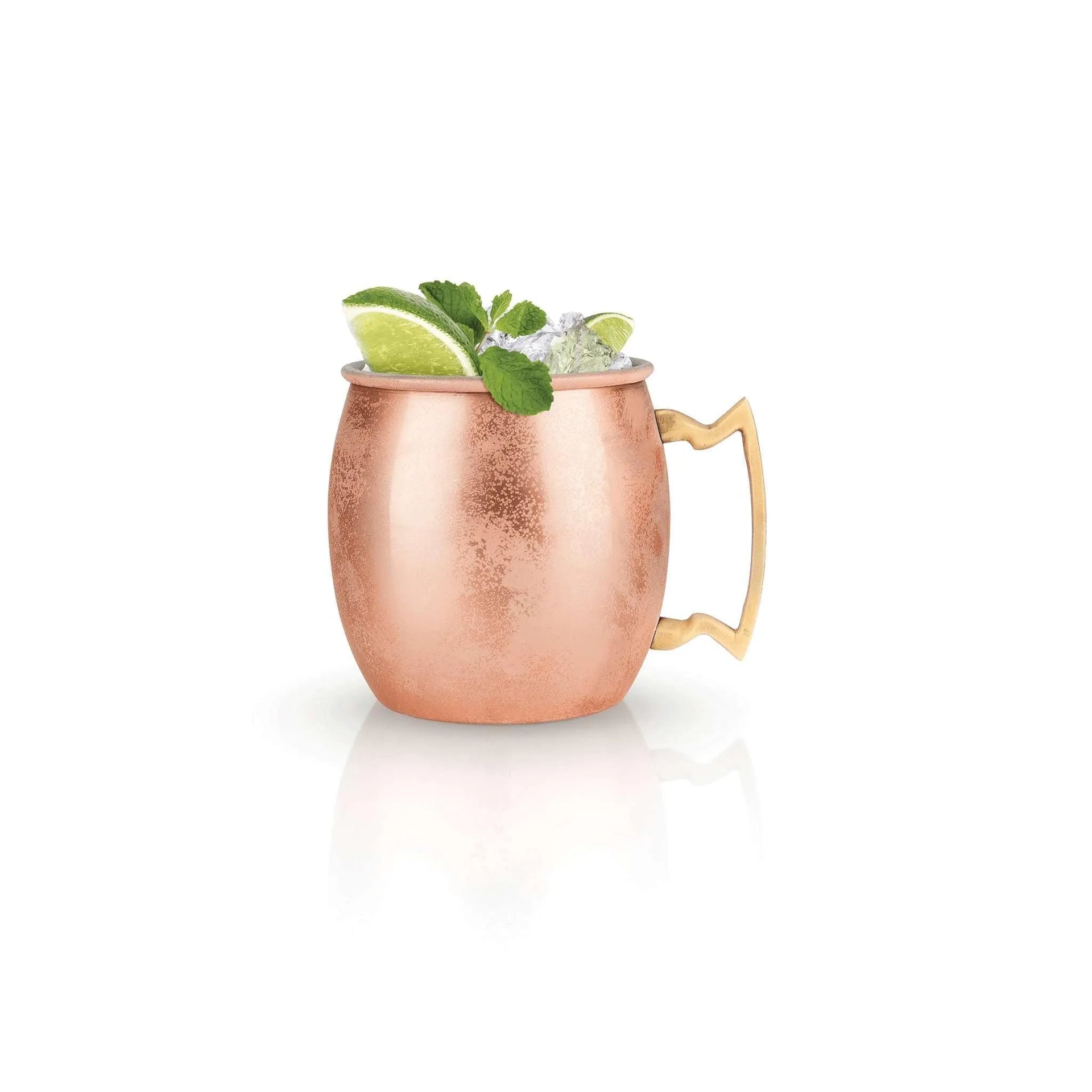 True Moscow Mule copper mug garnished with lime wedge and fresh mint