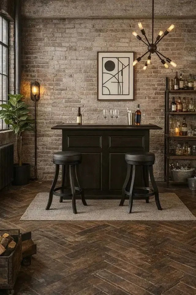 Black Malaysian Oak 60" English Pub-style dry bar with paneled front, two stools, and a modern industrial setting.