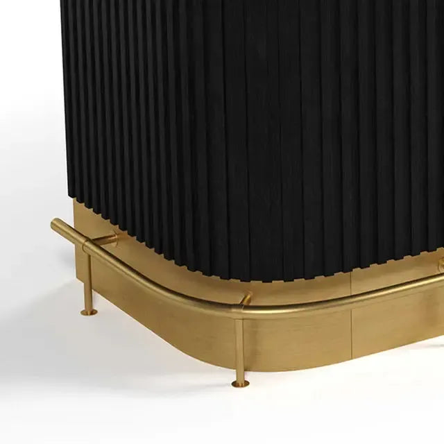 Polished Brass metal foot rail with adjustable levelers on a black ribbed Prohibition Series cocktail bar.