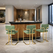 Prohibition Series 84" cocktail bar in Matte Walnut/Black with three green and brass bar stools.
