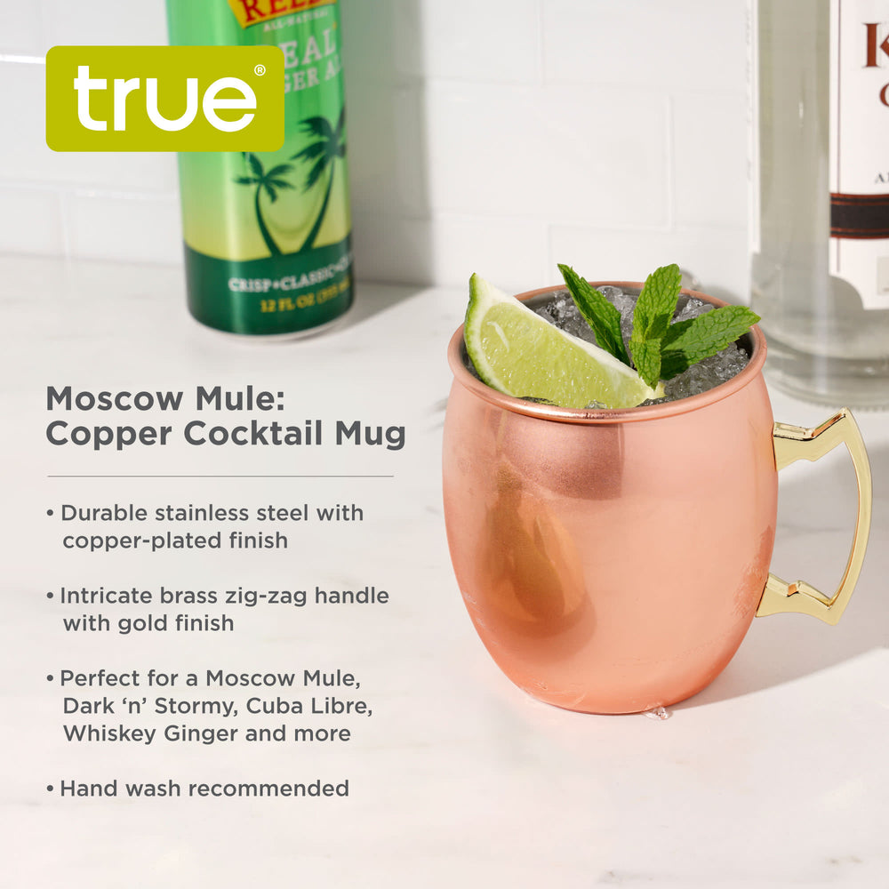 16 oz polished copper-plated Moscow Mule mug with a decorative brass zig-zag handle and a refreshing lime garnish.