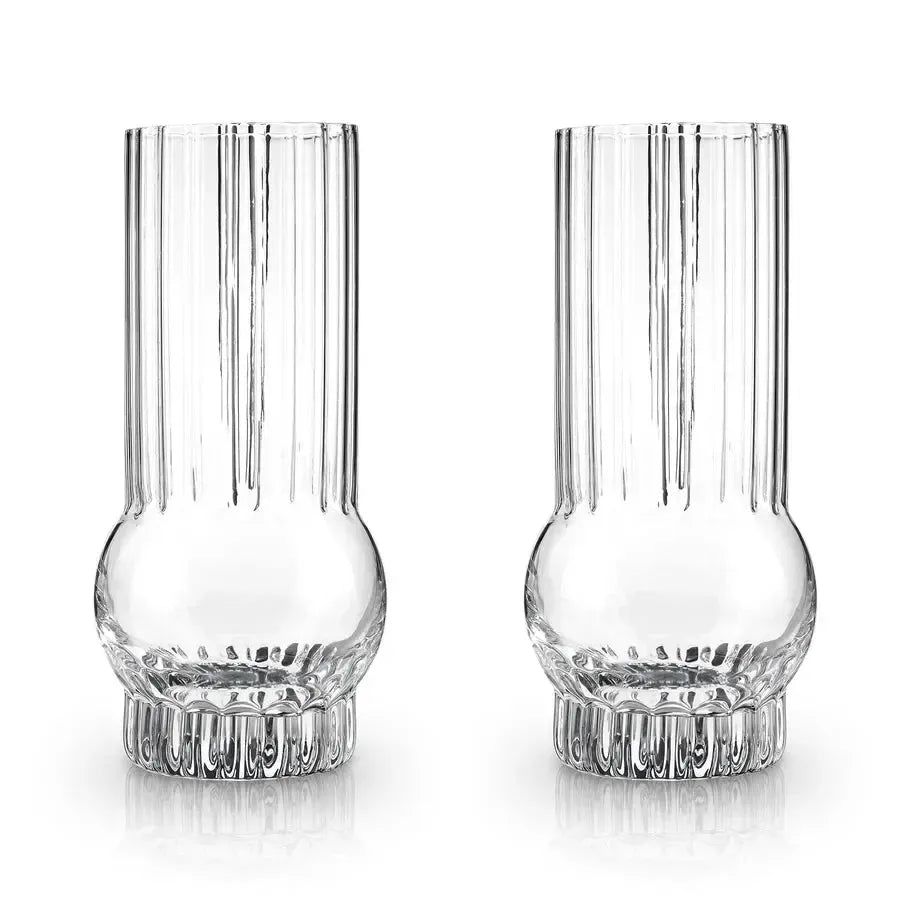 Set of 2 clear Viski Art Deco crystal highball glasses with ribbed details and round bases.