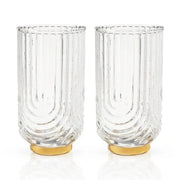 Set of 2 clear lead-free crystal highball glasses with gold electroplated bases and vertical ribbed Gatsby design.