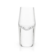 Clear lead-free crystal shot glass with a heavy base and polished curving rim.
