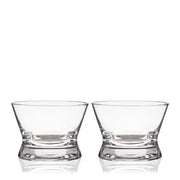 Set of two clear lead-free crystal tequila tasting glasses with wide bowls and flared lips.