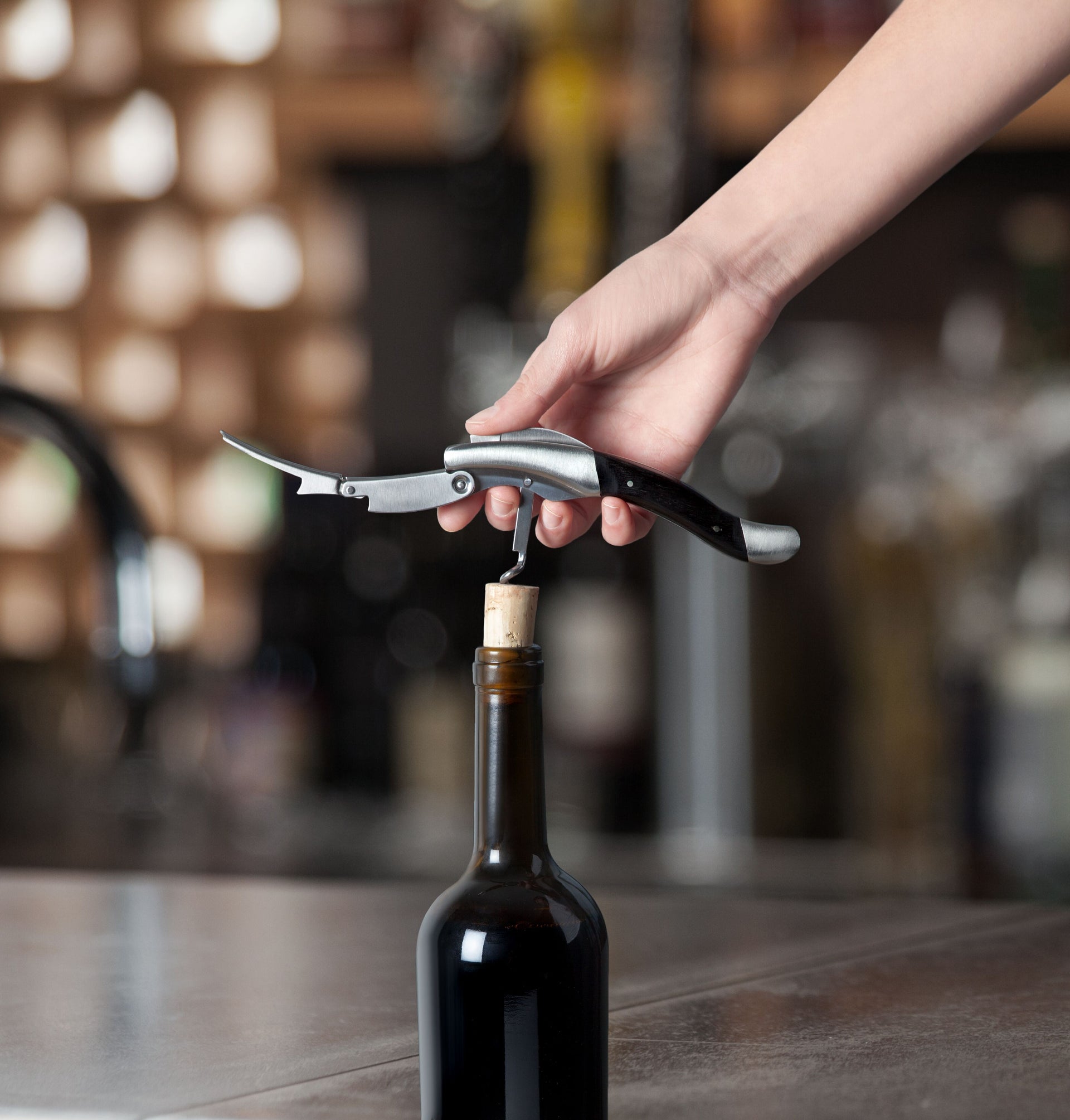 Admiral Oversized Double Hinged Corkscrew with Ebony Wood Inlay by Viski - in use